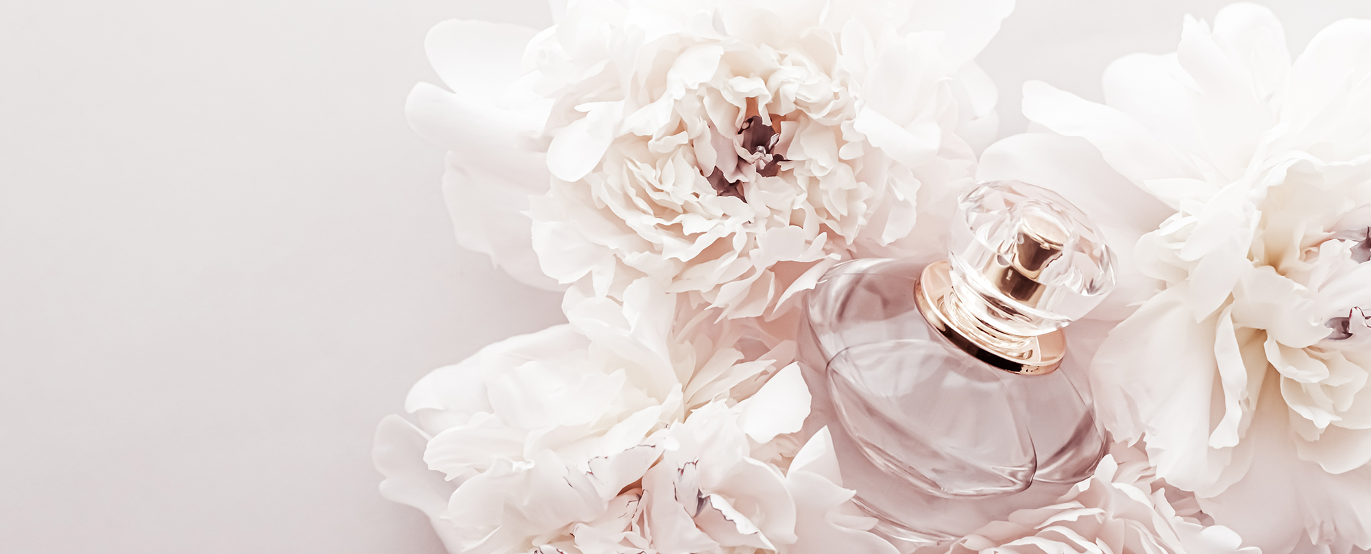 Fragrance,Bottle,As,Luxury,Perfume,Product,On,Background,Of,Peony