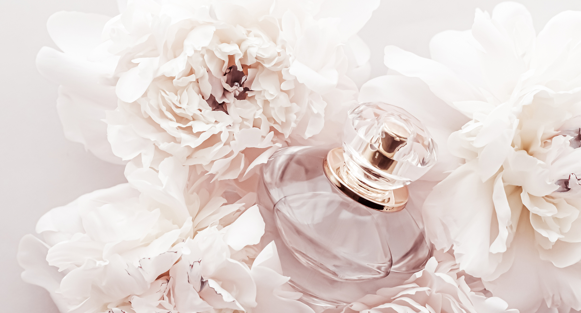 Fragrance,Bottle,As,Luxury,Perfume,Product,On,Background,Of,Peony